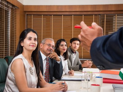 Asian Indian Business People or Corporate culture and Working in the office Concept with Laptop, papers, meetings, presentations and discussions
